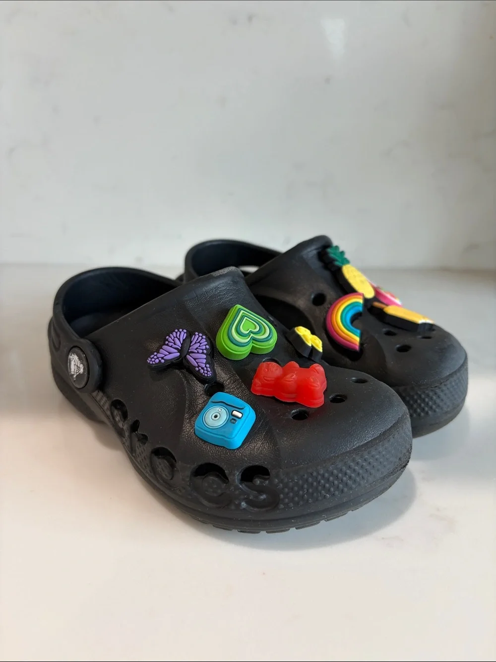 CROCS Kids Black Clogs with Colorful Charm Pins